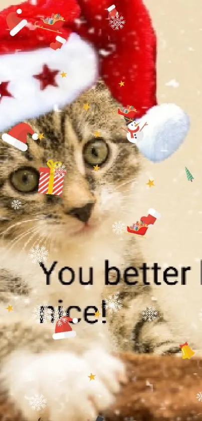 Cute kitten in Santa hat with text 'You better be nice'. Holiday wallpaper.