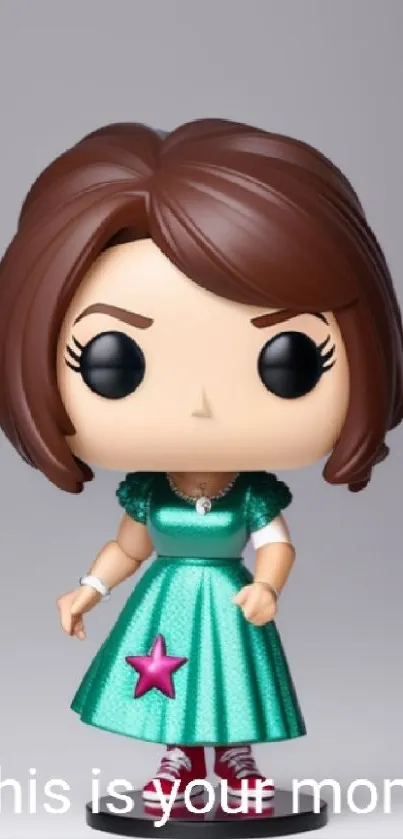 Cute figurine in teal dress with star decal.