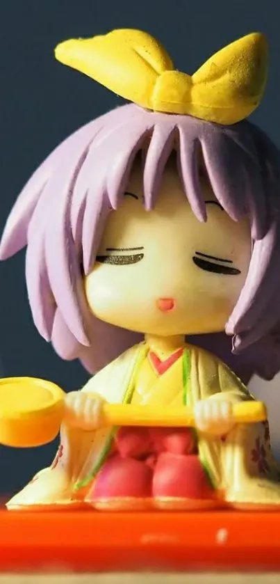 Cute anime figurine with lavender hair and yellow bow.