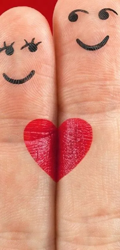 Two smiling fingers with a red heart on a mobile wallpaper.