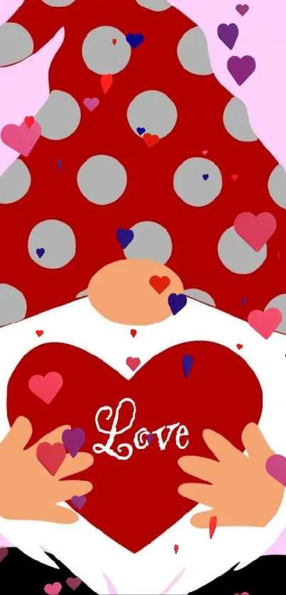 Gnome holding love heart with red polka dot hat.