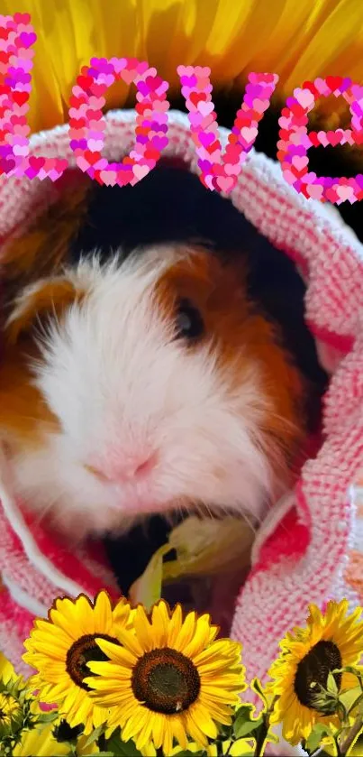 Guinea pig in pink blanket with sunflowers and a colorful love message.