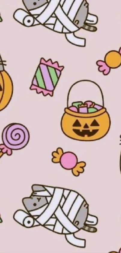 Cute Halloween cat wallpaper with pumpkins and candy on pastel pink background.