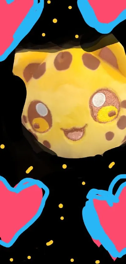 Yellow plush toy with colorful hearts and a black background.