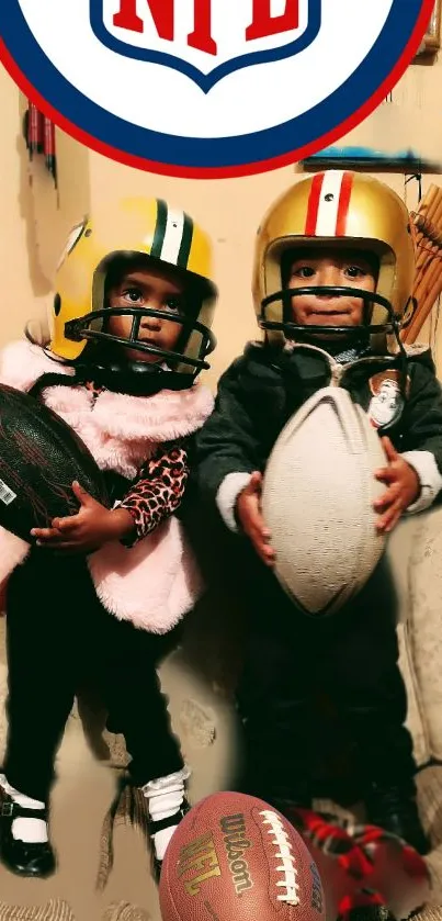 Kids in NFL helmets and jerseys holding footballs on a sofa.