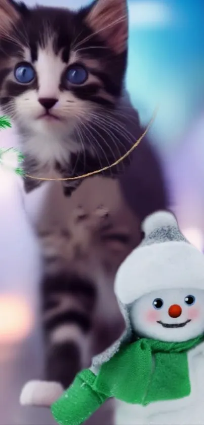 Playful kitten with blue eyes and snowman mobile wallpaper.