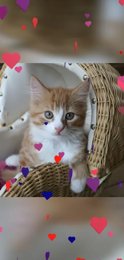 Ginger kitten in wicker basket with heart decorations.