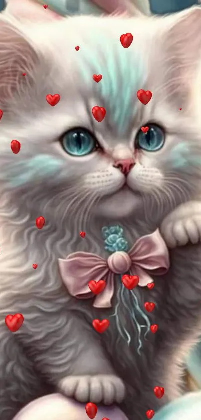 Cute kitten with a bow and red hearts wallpaper.