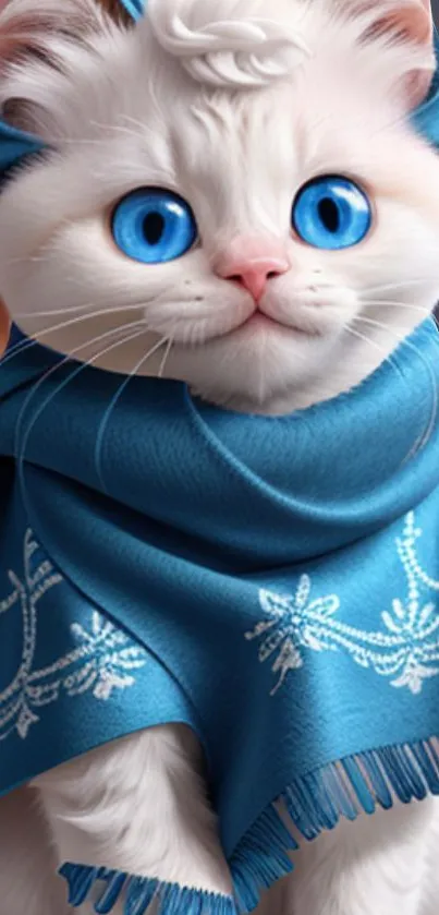 White kitten with blue eyes wearing a decorative blue scarf.