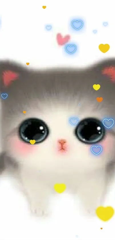 Adorable fluffy kitten with big eyes and a small heart above its head.