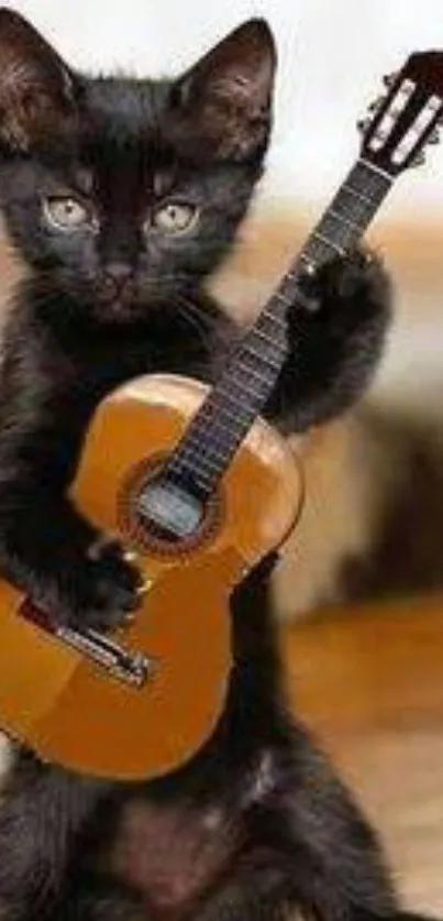 Black kitten holding tiny guitar mobile wallpaper.