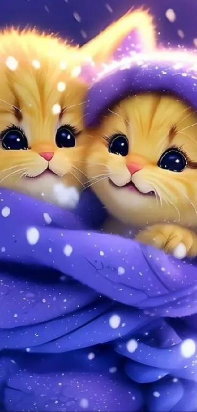 Two adorable kittens wrapped in purple fabric with snowflakes.