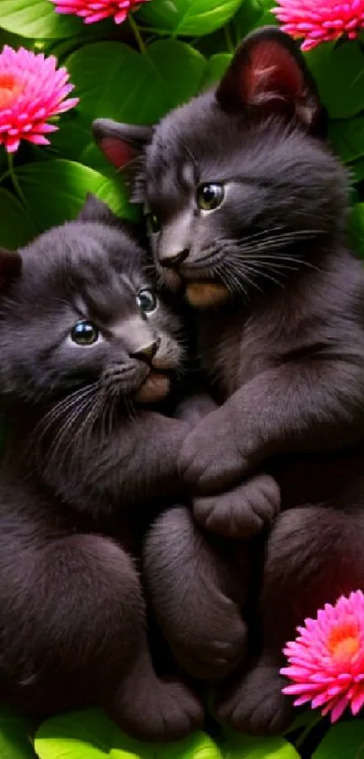 Two black kittens cuddling amidst green leaves and pink flowers, creating a cute scene.