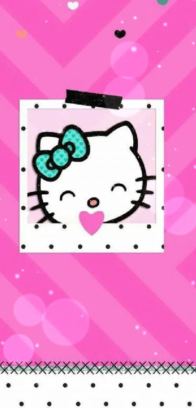 Cute pink wallpaper with a cartoon kitty and teal bow.