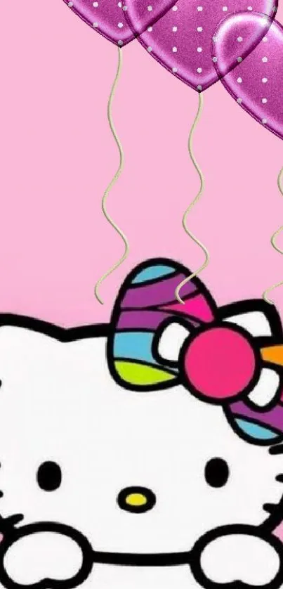 Cute Hello Kitty with rainbow bow and pink heart balloons on a pink background.