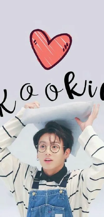 Adorable Kookie wallpaper with heart graphic and stylish striped shirt.