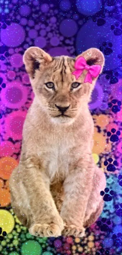 Adorable lion cub with pink bow on a colorful, sparkly background.