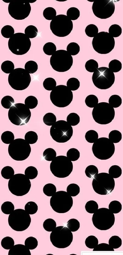 Mickey Mouse silhouettes on pink wallpaper background.