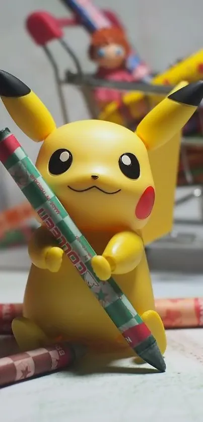 Pikachu figurine holding a crayon surrounded by colorful art supplies.