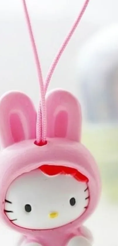 Cute pink bunny figurine wallpaper for phones.