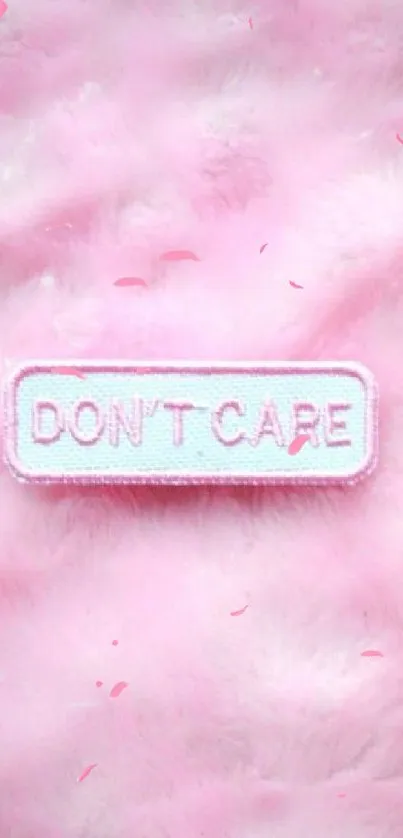 Pink furry wallpaper with 'Don't Care' patch.