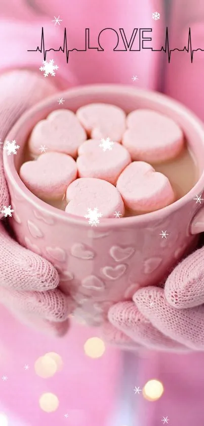 Pink heart mug with marshmallows and a 'love' design.