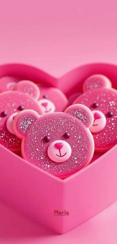 Heart-shaped box with pink teddy bear cookies with sparkle.