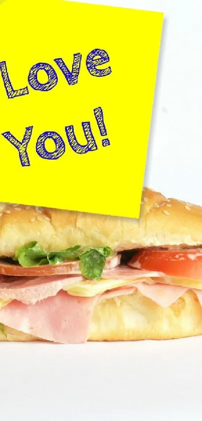 Sandwich with yellow love note on white background.