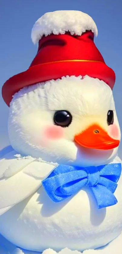 Adorable snow duck with red hat and blue bow.