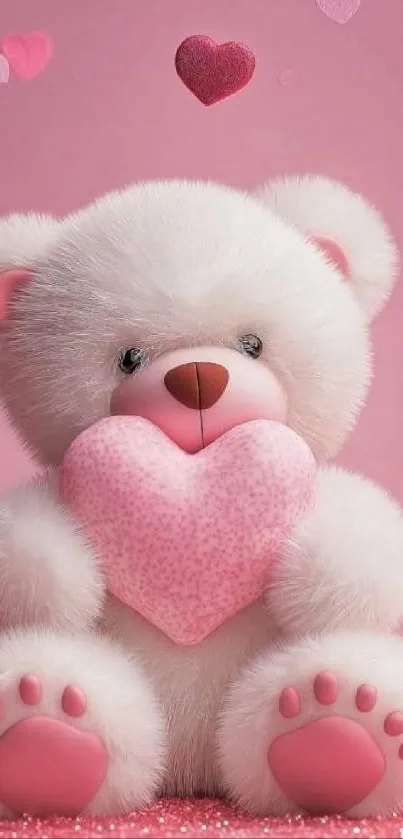 Cute teddy bear with heart on pink background.