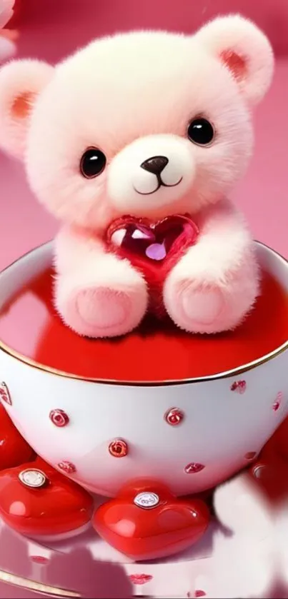 Teddy bear holding a heart in a teacup.