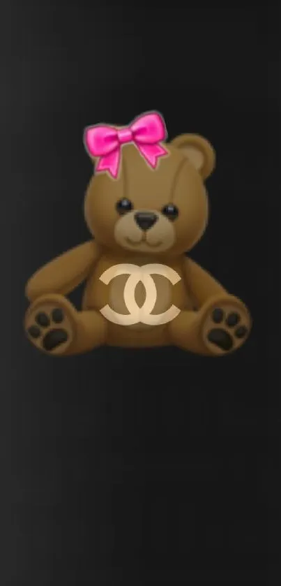 Cute teddy bear with pink bow on black background.