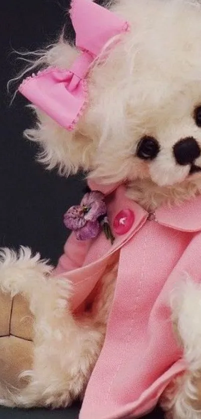 Charming fluffy teddy bear in pink outfit mobile wallpaper.