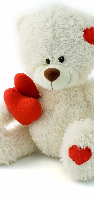 Adorable white teddy bear with red hearts perfect for mobile wallpaper.