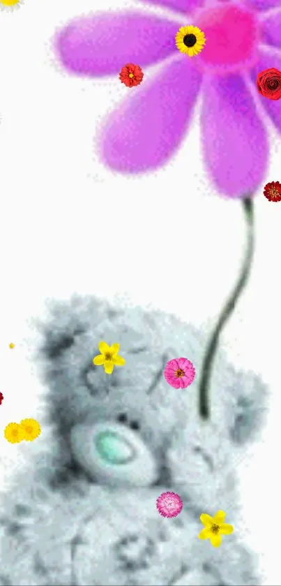 Cute grey teddy bear holding a vibrant purple flower.