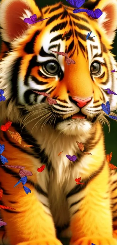 Adorable tiger cub sitting on grass in vibrant wallpaper.