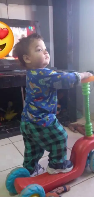 Adorable toddler in colorful outfit rides a toy scooter indoors.