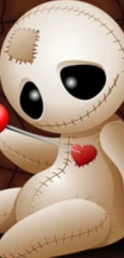 Cute voodoo doll holding a red lollipop, with heart detail.