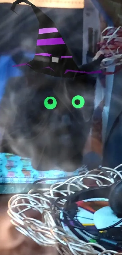 A cute black cat with a witch hat and green eyes sitting on a wooden table.