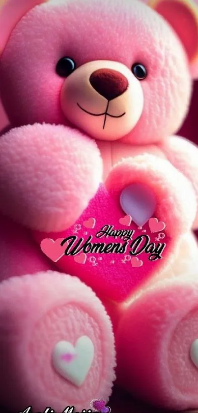 Cute pink teddy bear with heart for Women's Day.