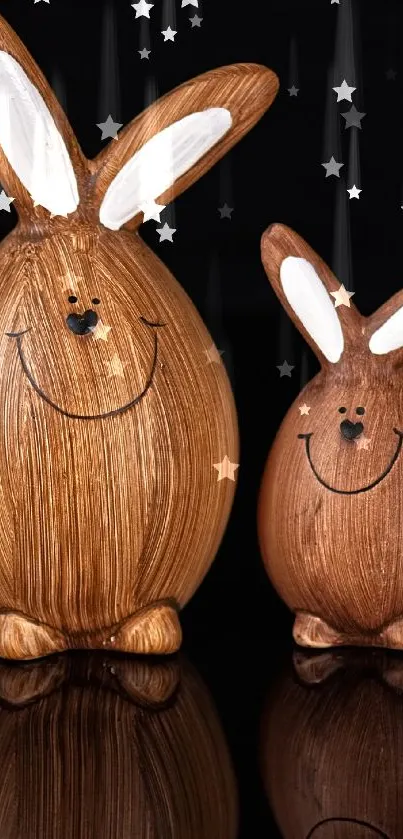 Two cute wooden bunny figures on a black background.