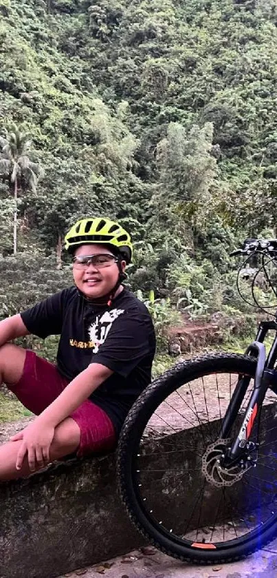 Cyclist smiling beside a bike in lush green scenery.