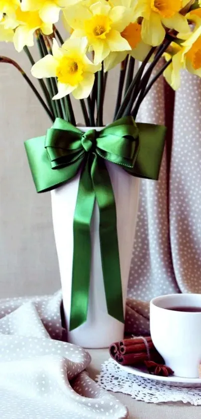 Mobile wallpaper with daffodils in a vase and a green bow.