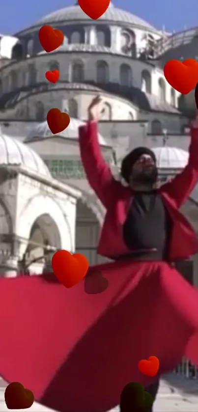 Dancer in red spinning in front of a mosque