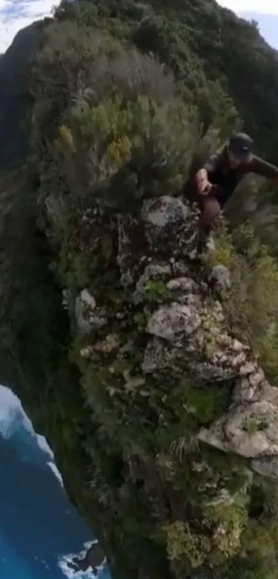 Daring adventurer climbing a steep cliff with ocean view.