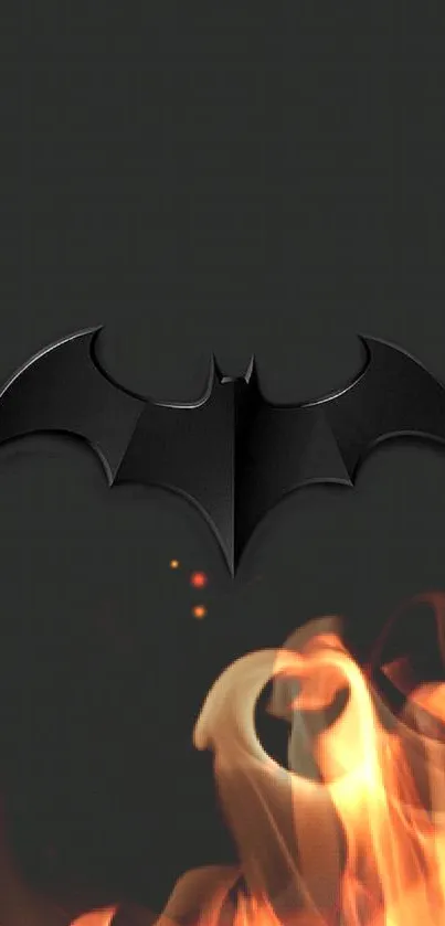 A dark wallpaper featuring a bat symbol with fiery accents.