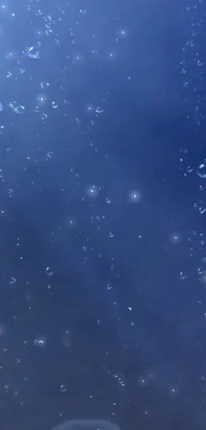 Dark blue wallpaper with underwater bubbles.