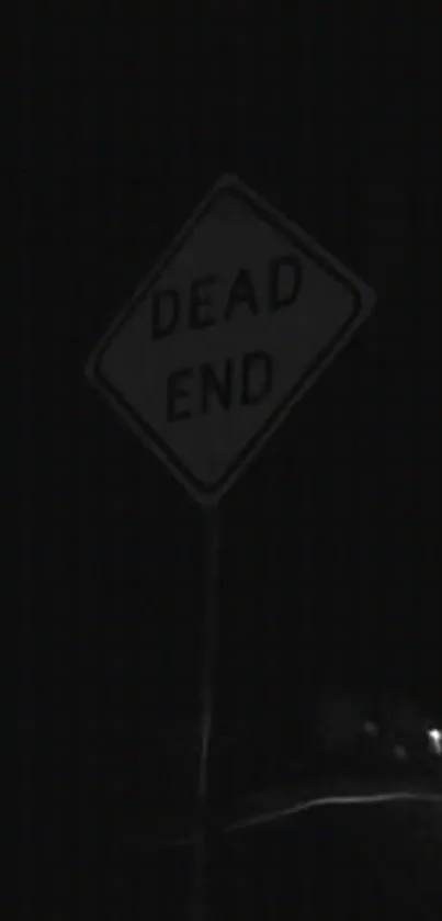 Dark wallpaper featuring a 'Dead End' street sign.