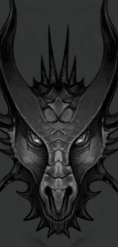 Dark dragon artwork with intricate details in grayscale.