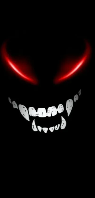 Mysterious face with glowing red eyes on dark background.